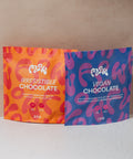 Front view of the Flow by Blendsmiths Irresistible Chocolate 2kg pouch in orange and red, labelled high fibre and vegan friendly
