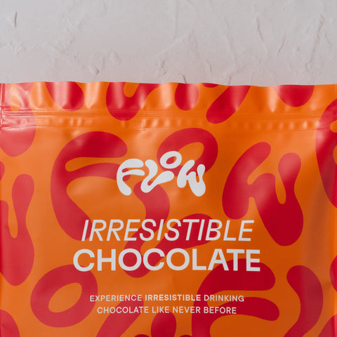 Close-up of the Flow Irresistible Chocolate logo and tagline: Experience irresistible drinking chocolate like never before