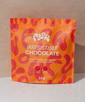 Flow Irresistible Chocolate 2kg pouch against a warm beige wall
