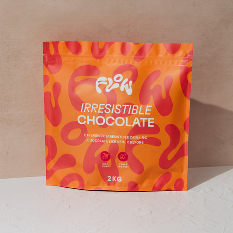 Flow Irresistible Chocolate 2kg pouch against a warm beige wall
