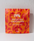 Front view of the Flow by Blendsmiths Irresistible Chocolate 2kg pouch in orange and red, labelled high fibre and vegan friendly