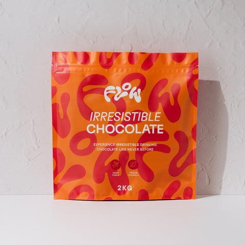 Front view of the Flow by Blendsmiths Irresistible Chocolate 2kg pouch in orange and red, labelled high fibre and vegan friendly