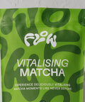 Close-up of the Flow Vitalising Matcha logo and tagline: Experience deliciously vitalising matcha moments like never before