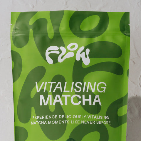 Close-up of the Flow Vitalising Matcha logo and tagline: Experience deliciously vitalising matcha moments like never before