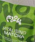 Angled close-up of the top of the Flow Vitalising Matcha pouch, showing the resealable zip